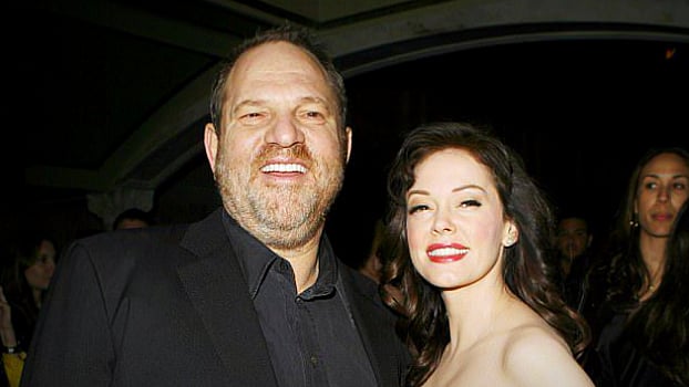 Harvey Weinstein with Rose McGowan at an event. 