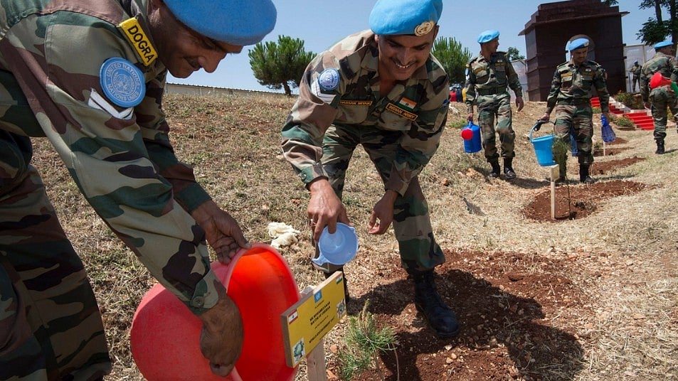 Image of members of the ETF launching an afforestation drive. 