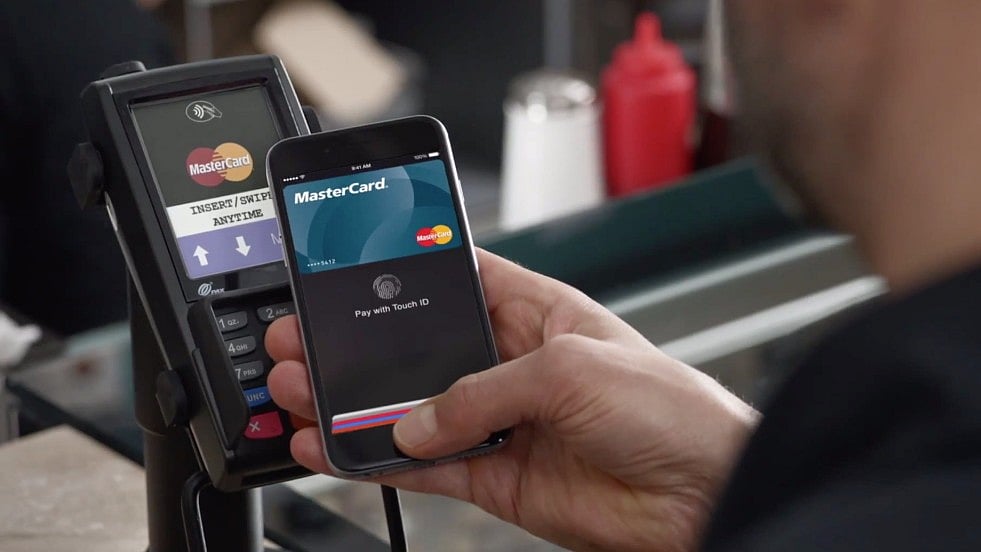 Apple Pay works on iPhone via NFC on payment terminals. 
