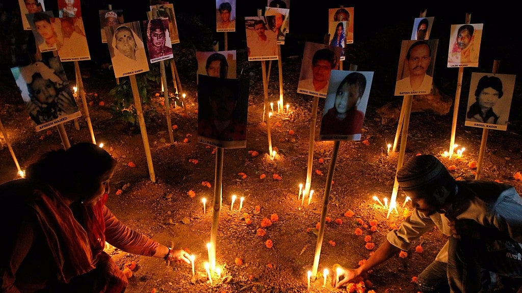 People light candles during a prayer ceremony in Ahmedabad for the victims of the Godhra train. Photo used for representational purpose.
