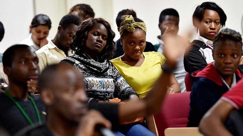 African students in Bangalore at a meeting with the police in Bengaluru. (Photo: PTI)
