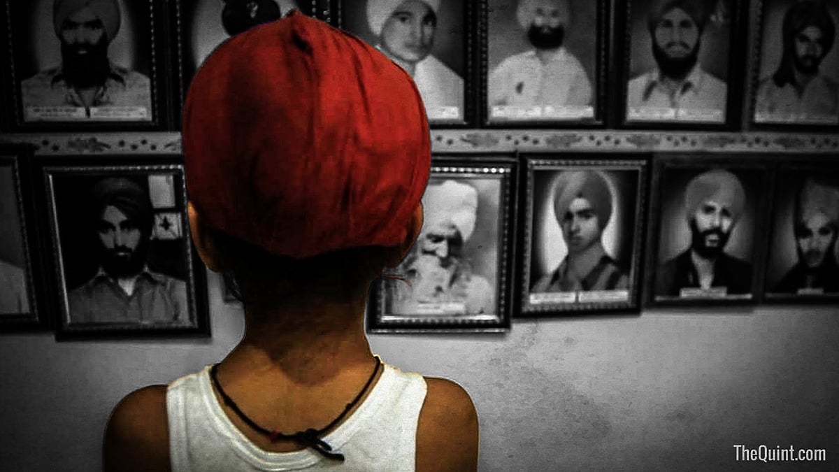A young child at the memorial of martyrs in Tilak Vihar, New Delhi