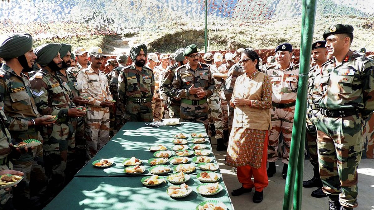 Defence Minister Nirmala Sitharaman interacting with the officers and jawans at Kibithu, Arunachal Pradesh on Sunday. 