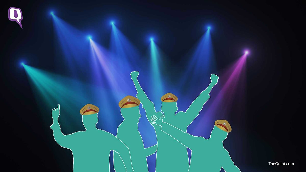 Police officials organise a disco party at the main gate of the police station.