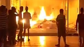  Shouting slogans against the management, students staged a demonstration at the the college gate and set the mattresses on fire.