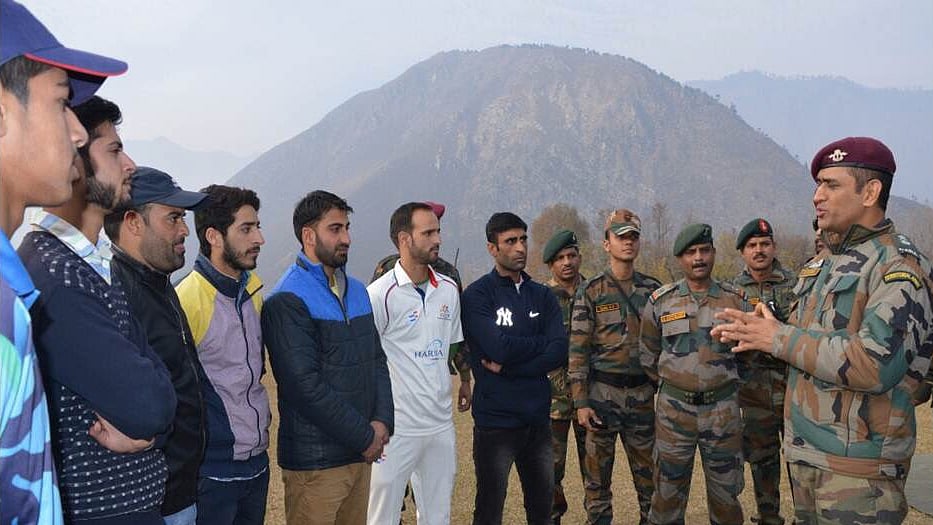 Mahendra Singh Dhoni interacting with young cricketers of Jammu and Kashmir.