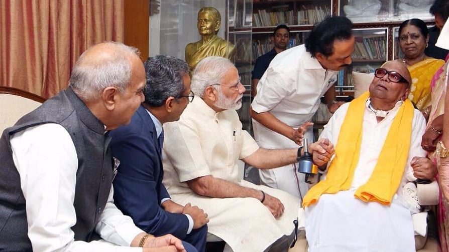 PM Modi meets DMK chief Karunanidhi.