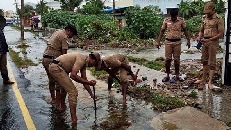 Chennai police jump into action in the middle of the rains.