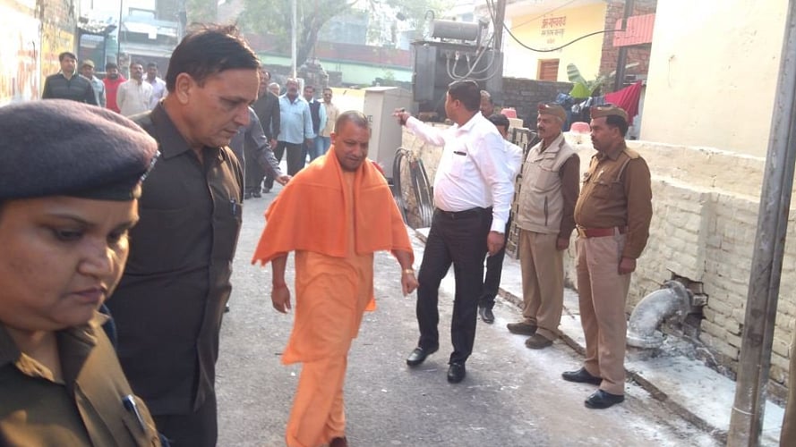 Uttar Pradesh Chief Minister Yogi Adityanath arrives at the polling station in Gorakhpur.
