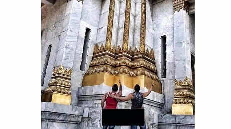Two Americans have been arrested in Thailand for posting a photo of themselves with their rear ends exposed at a Buddhist temple.