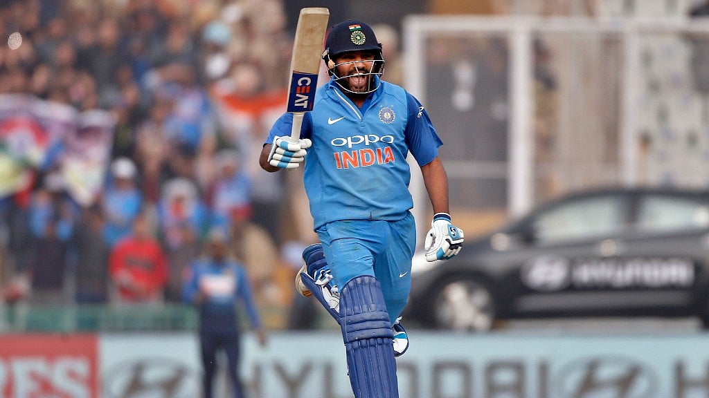 ia’s captain Rohit Sharma runs to celebrate scoring a double century during their second one-day international cricket match against Sri Lanka in Mohali on 13 Decem