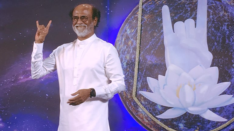 Rajini makes the “baba” symbol, a trademark of his character from ‘Baba’
