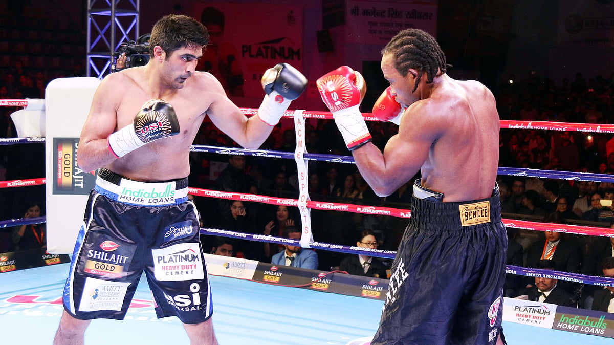 Vijender Singh (left) last defended his WBO Oriental and Asia Pacific Super middleweight titles. against Ernest Amuzu in 2017.