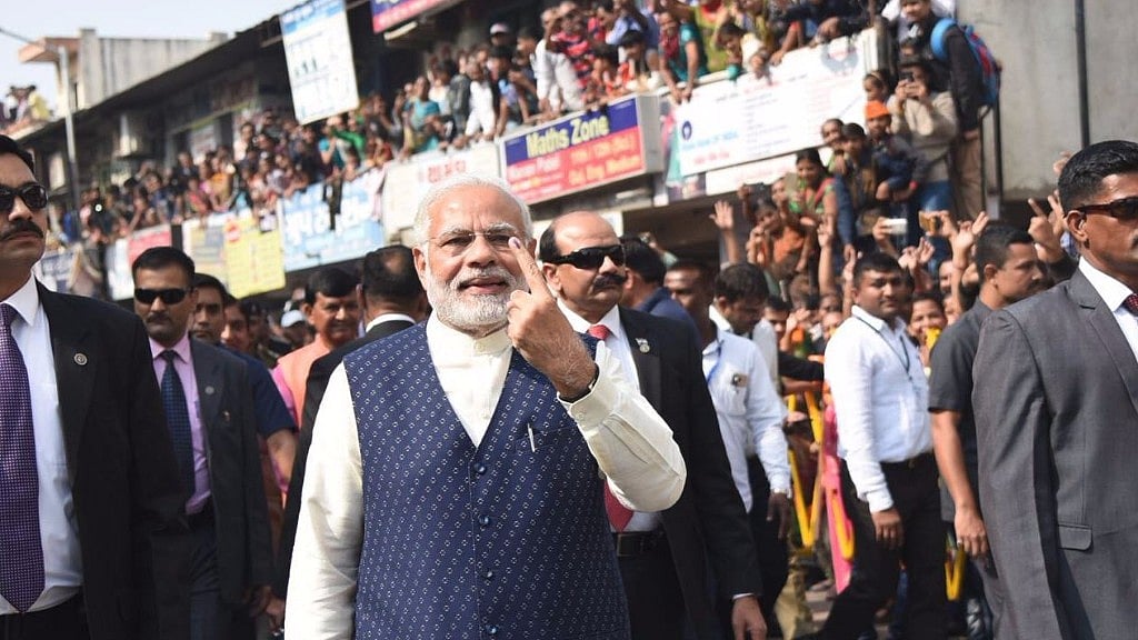 PM Modi after casting his vote on 14 December.