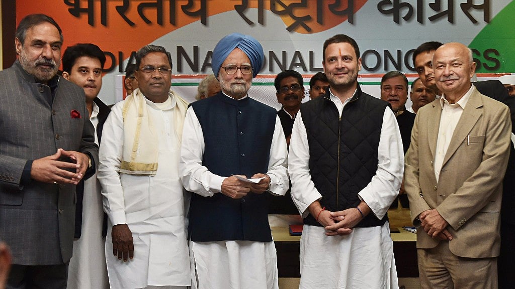 Congress Vice President Rahul Gandhi with senior party leaders after filing nomination for the post of party president.