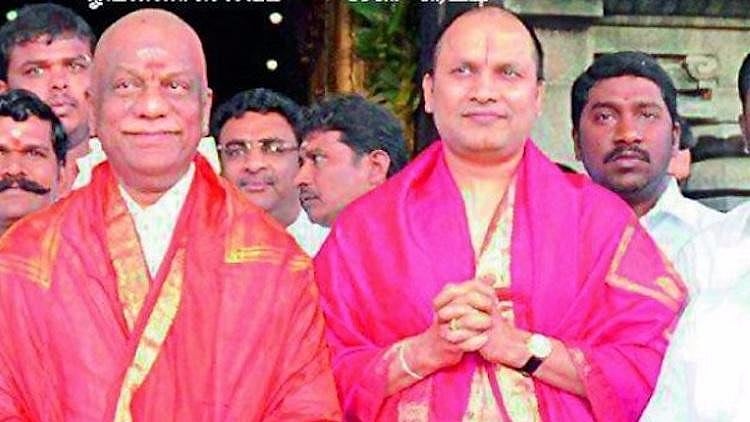 Former TN Chief Minister O Panneerselvam (left) and mining baron Sekar Reddy(right)