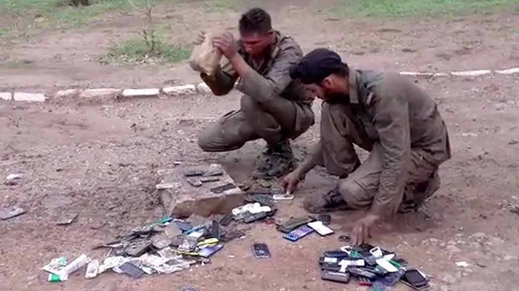Officers smash cellphones of over 50 recruits with rocks and stones.&nbsp;