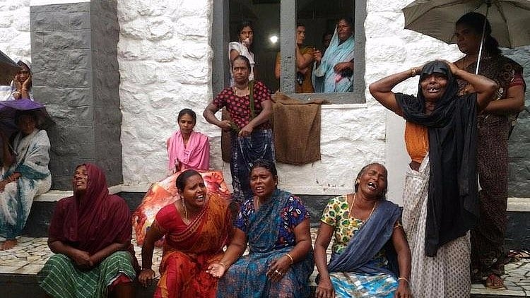 The family and friends of the fisherfolk crying.