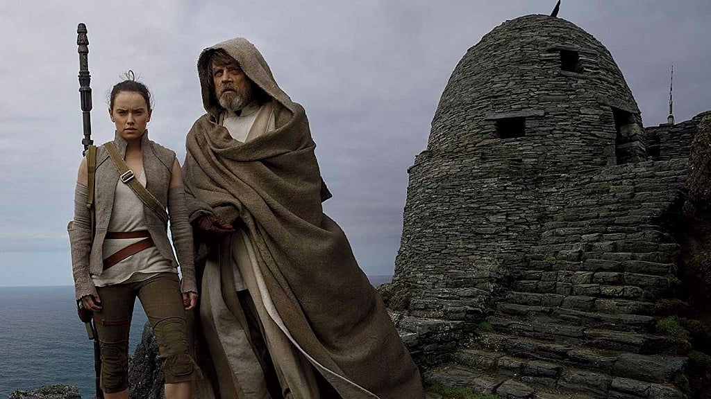 Daisy Ridley as Rey and Mark Hamill as Luke Skywalker in <i>Star Wars: The Last Jedi.</i>