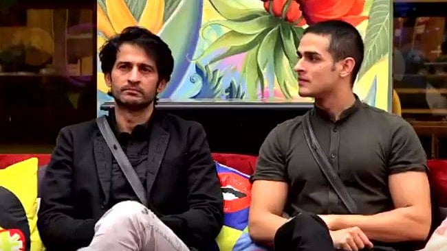 Hiten Tejwani and Priyank Sharma await the eviction announcement.