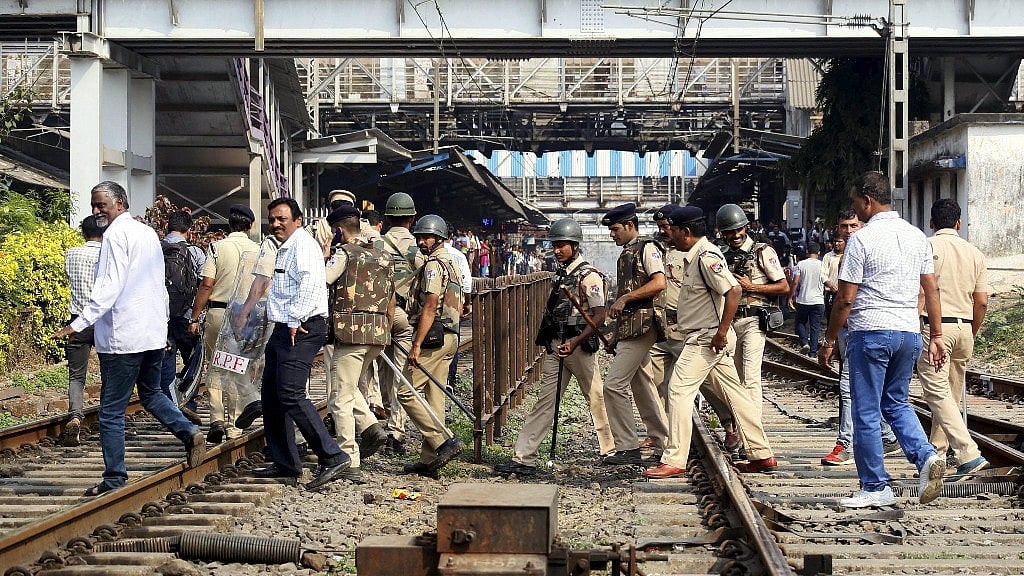 Police officials patrol after Dalits called for Maharashtra bandh in protest over Bhima Koregaon violence, in Mumbai on Wednesday. 