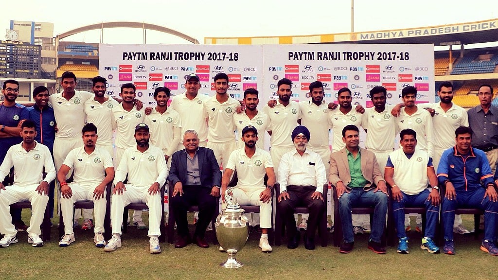 The Vidarbha team pose for a picture with the Ranji Trophy. 