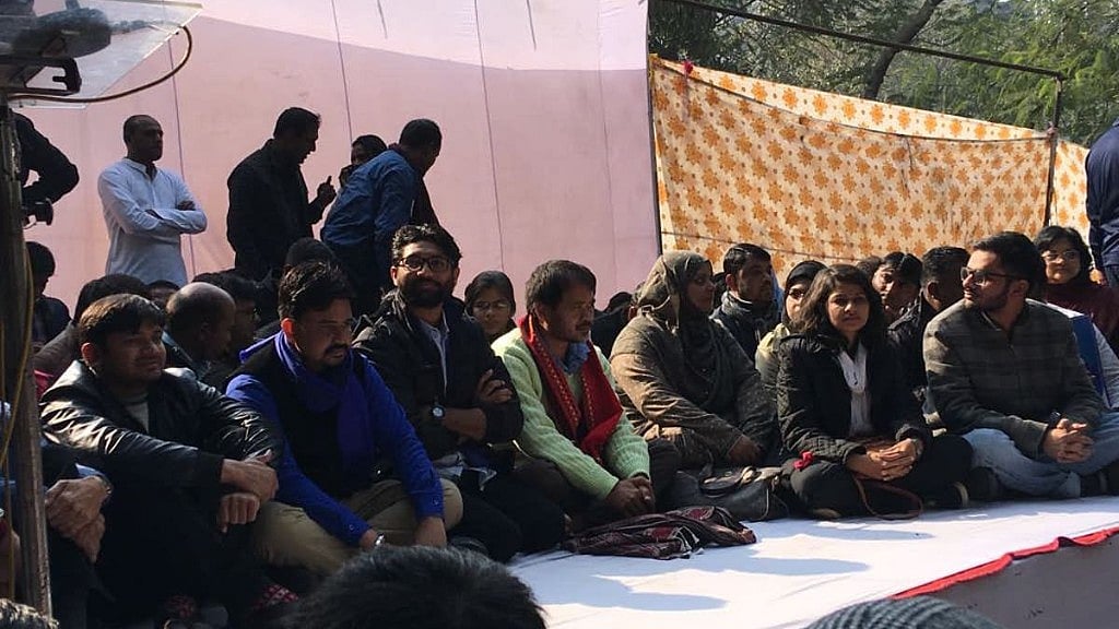 Umar Khalid, Jignesh Mevani, Kanhaiya Kumar and others hold a demonstration at Parliament Street in New Delhi.&nbsp;
