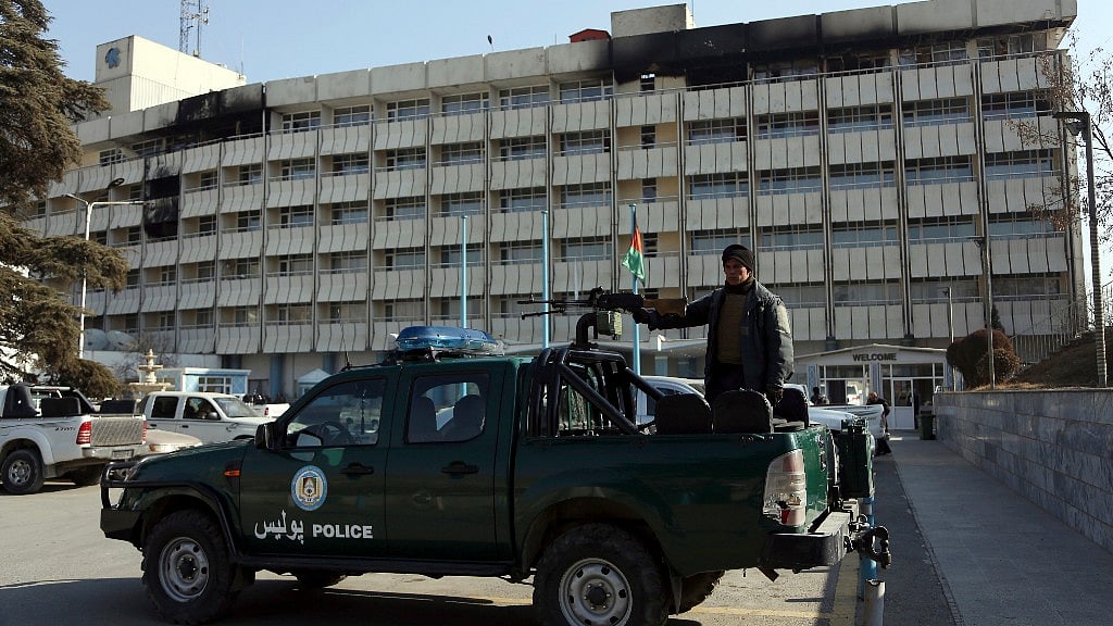 An Afghan police officer stands guard in front of the Intercontinental Hotel in Kabul, Afghanistan. Image for representational purposes.
