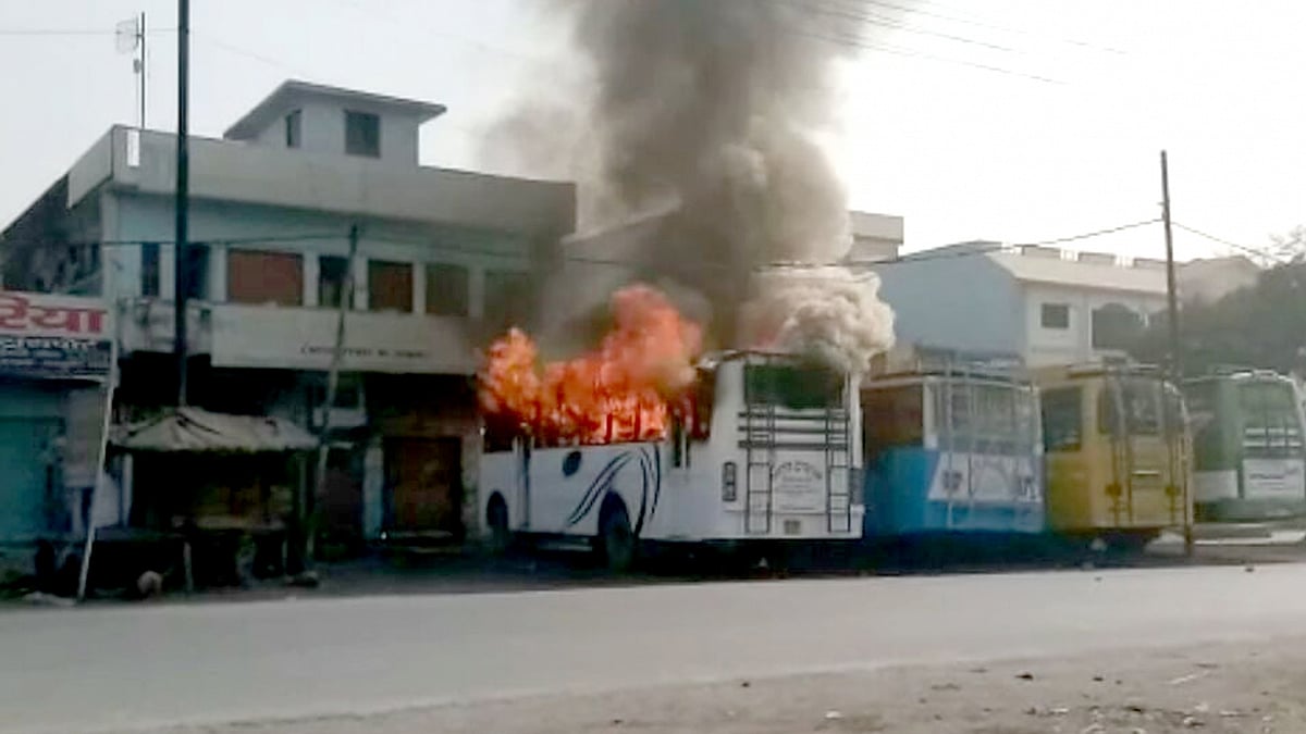 A bus set on fire by an irate mob as two communities clashed in Kasganj district of Uttar Pradesh on 27 Jan, 2018. 