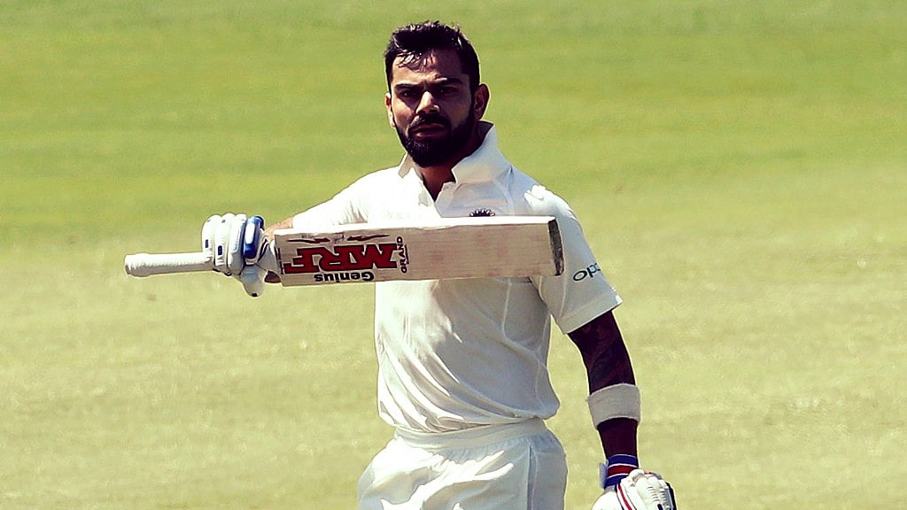 Virat Kohli celebrates after scoring a century in the Centurion Test. 