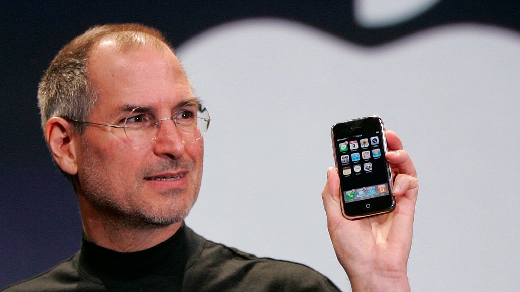 Steve Jobs with the first iPhone on 9 January 2007.&nbsp;
