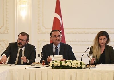 ISTANBUL, Jan. 21, 2018 (Xinhua) -- Turkish Deputy Prime Minister Bekir Bozdag (C) answers a question at a press conference in Istanbul, Turkey, on Jan. 21, 2018. Turkish President Recep Tayyip Erdogan on Sunday voiced hope for the ongoing military operation against Kurdish militia in Syria