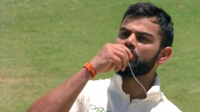 Indian Captain Virat Kohli kisses his wedding ring after scoring 150 at the Centurion. 