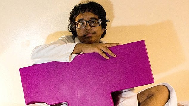 The infatuated 20-year-old hangs out with her Tetris-shaped object. 