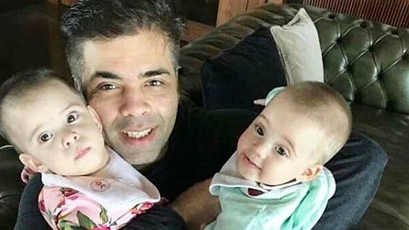 Karan Johar and his twins, Roohi and Yash. 