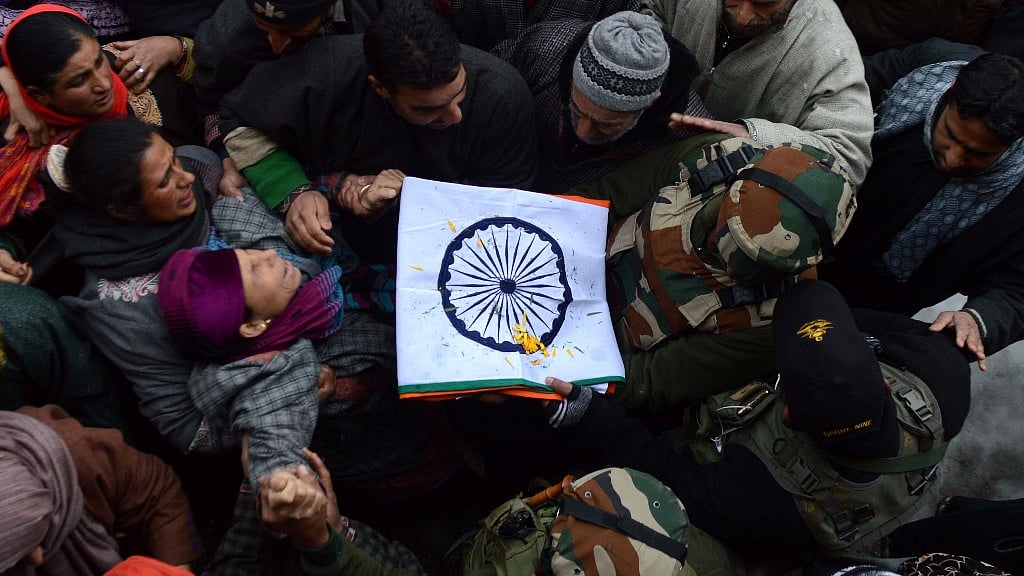 People flood the streets of Kashmir for the last rites of Manzoor Ahmad Deva despite heavy snowfall on Tuesday.