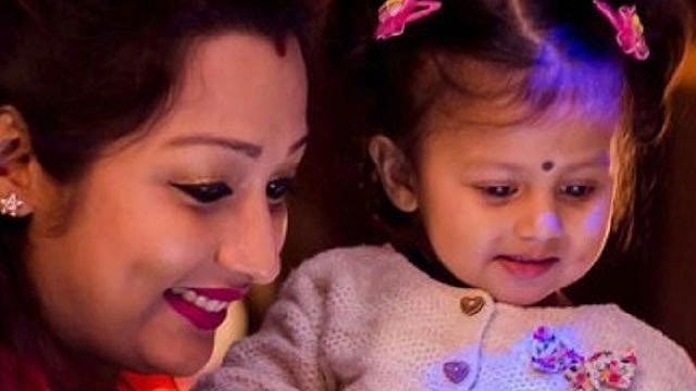 Shampa Paul Dey with Oyetri on her first birthday.