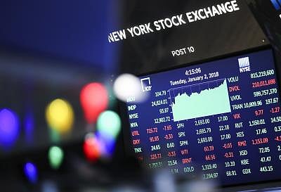 Market indexes are seen on a screen at the New York Stock Exchange in New York 