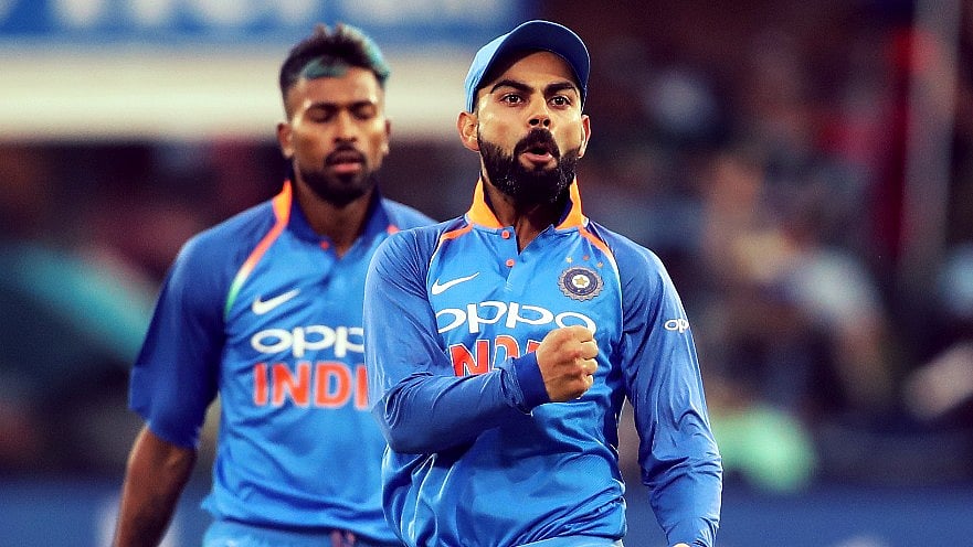 Virat Kohli celebrates a wicket during the fifth ODI against South Africa as Hardik Pandya looks on.