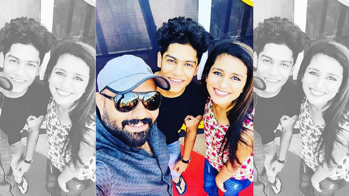 Director Omar Lulu with Roshan Abdul Rahoof and Priya Prakash Varrier.