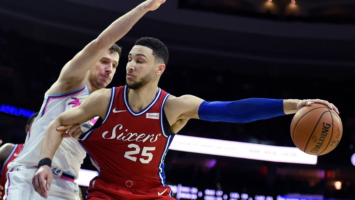 Philadelphia 76ers’ Ben Simmons (25) drives to the basket around Miami Heat’s Goran Dragic (7) in the second half of an NBA basketball game, Wednesday, Feb. 14, 2018, in Philadelphia. The 76ers won 104-102.&nbsp;