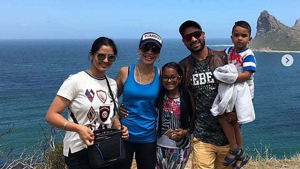 Picture of Indian cricketer Shikhar Dhawan and his family.