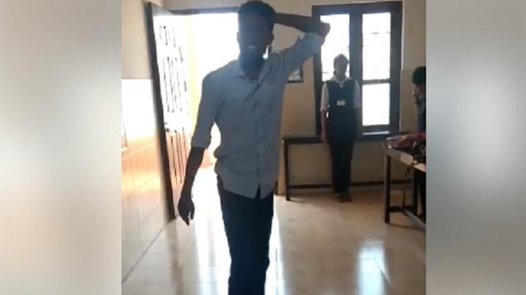 In a video of the incident that was circulated among college students, Aslam can be seen moving around the classroom while the rest of his classmates stand as the anthem is played.