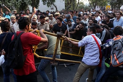 New Delhi: Police charge water cannons on JNU students participating in "Long March" in New Delhi, on March 23, 2018. (Photo: IANS)