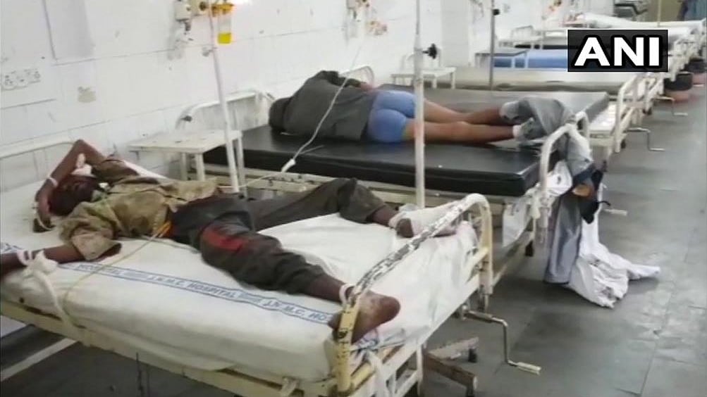Two patients were seen lying on their bed with their hands and legs tied in Aligarh Muslim University’s Jawaharlal Nehru Medical College on 31 March.
