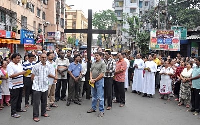 Kolkata: People participate in a procession organised on Good Friday in Kolkata, on March 30, 2018. (Photo: Kuntal Chakrabarty/IANS)