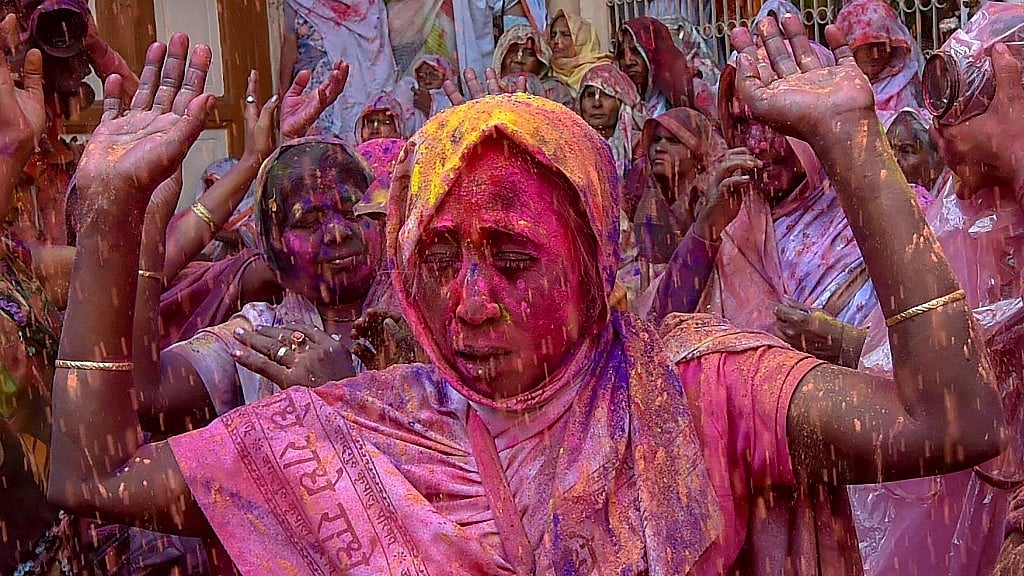 Widows celebrate the festival of Holi in Vrindavan. 