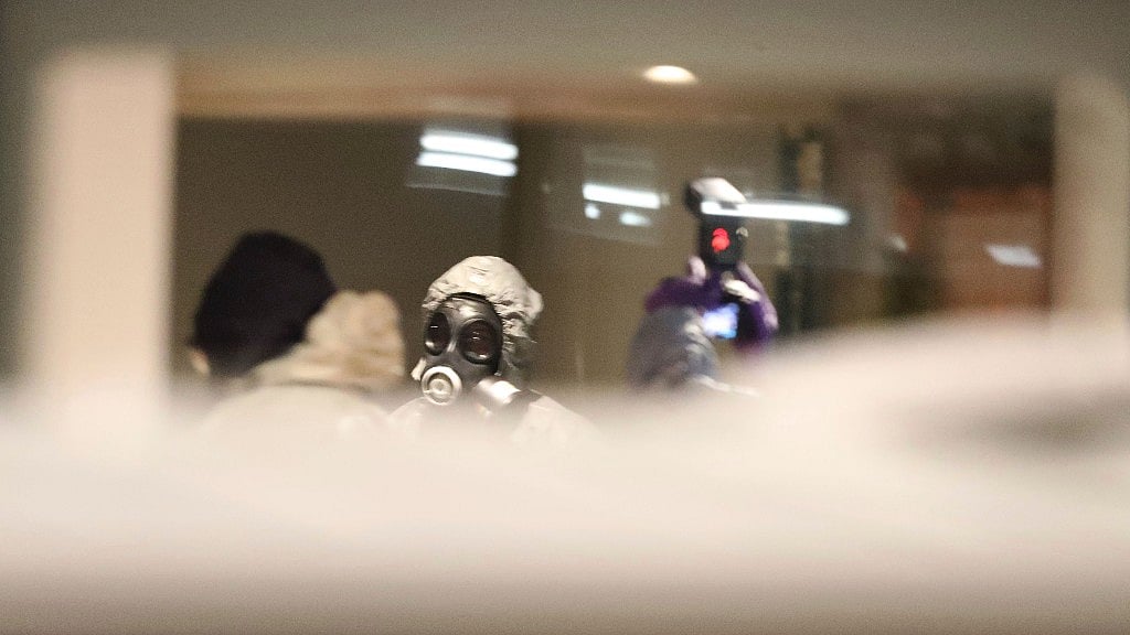 Investigators inside the Zizzi restaurant in Salisbury, England, Tuesday, March 6, 2018 near to where former Russian double agent Sergei Skripal was found critically ill.