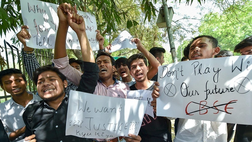 Students protest at Jantar Mantar in New Delhi over retest after CBSE Class X Mathematics and Class XII Economics paper leaked. 
