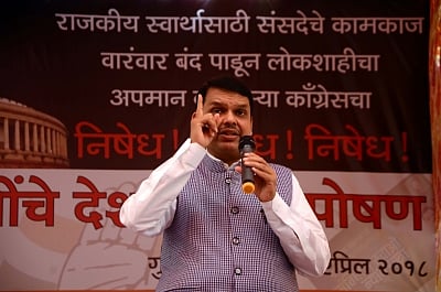 Mumbai: Mumbai: Maharashtra Chief Minister and BJP leader Devendra Fadnavis addresses during a day-long fast called by the party to protest the disruption of Parliament